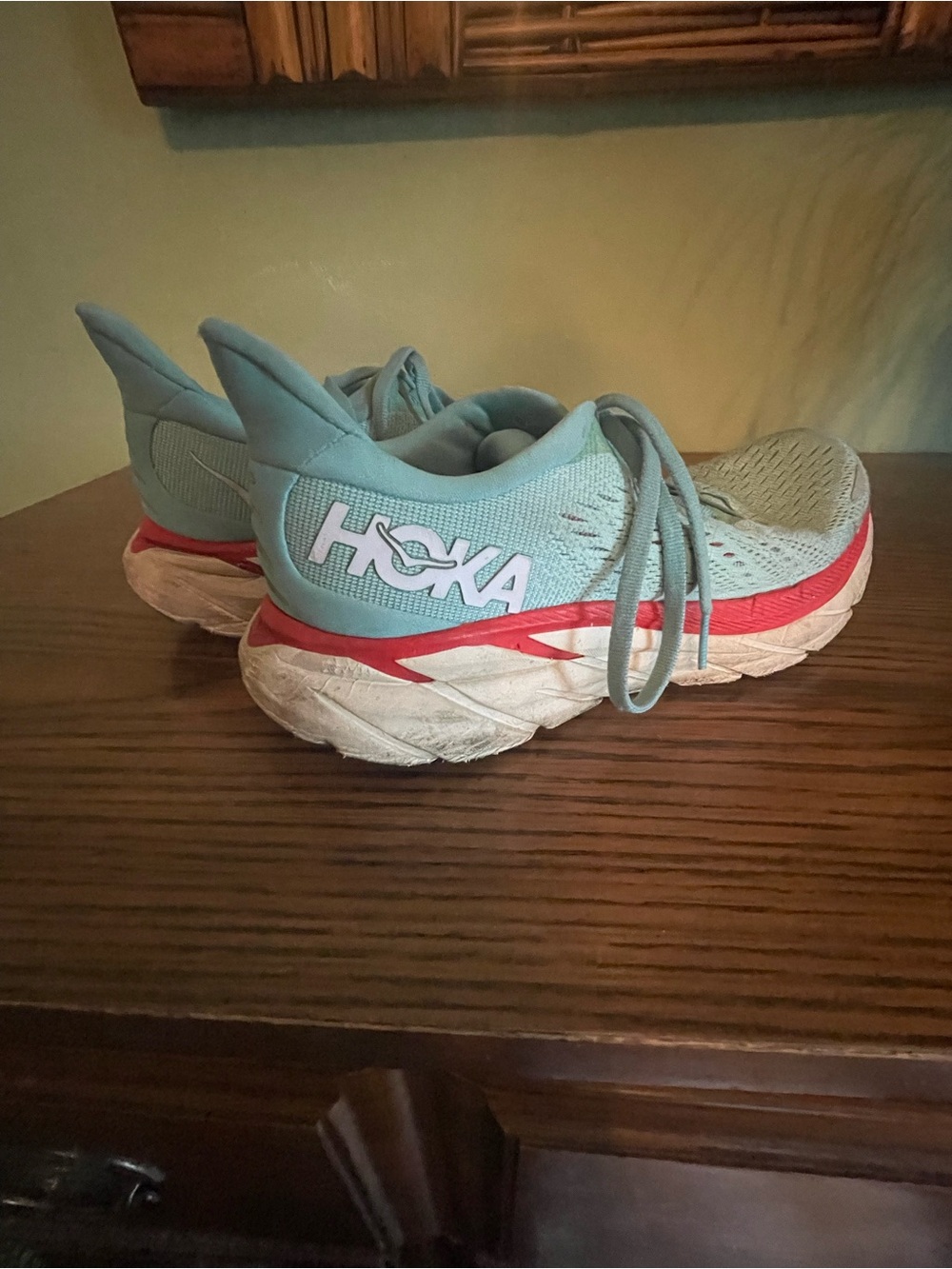 HOKA Turquoise and Coral Clifton 8 Runners